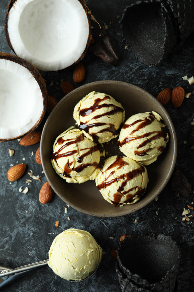 Serving Creamy Coconut Almond Ice Cream with Chocolate Drizzle